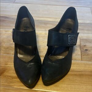 Fidji Leather Black Women's heels with Silver buckle accents